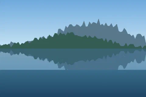 A calm blue lake mirroring a forested ridge under a clear sky
