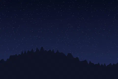 A night sky full of stars over a black mountain ridge